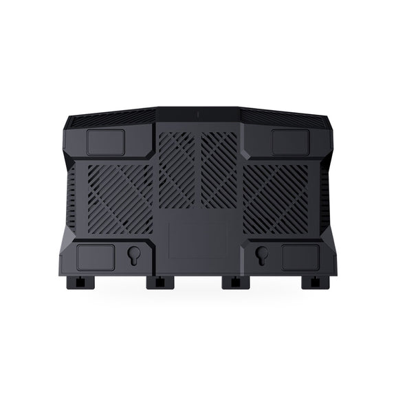 GL.iNet Flint 3 router underside showing ventilation and wall-mount keyholes